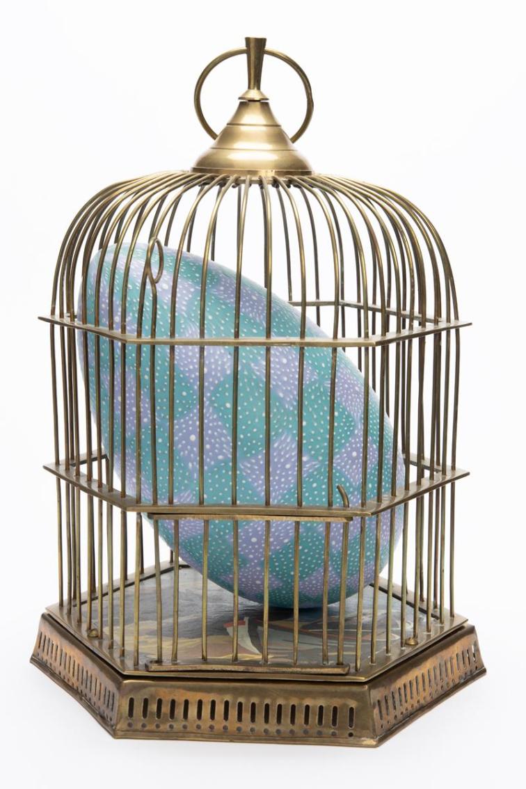 Egg in Cage