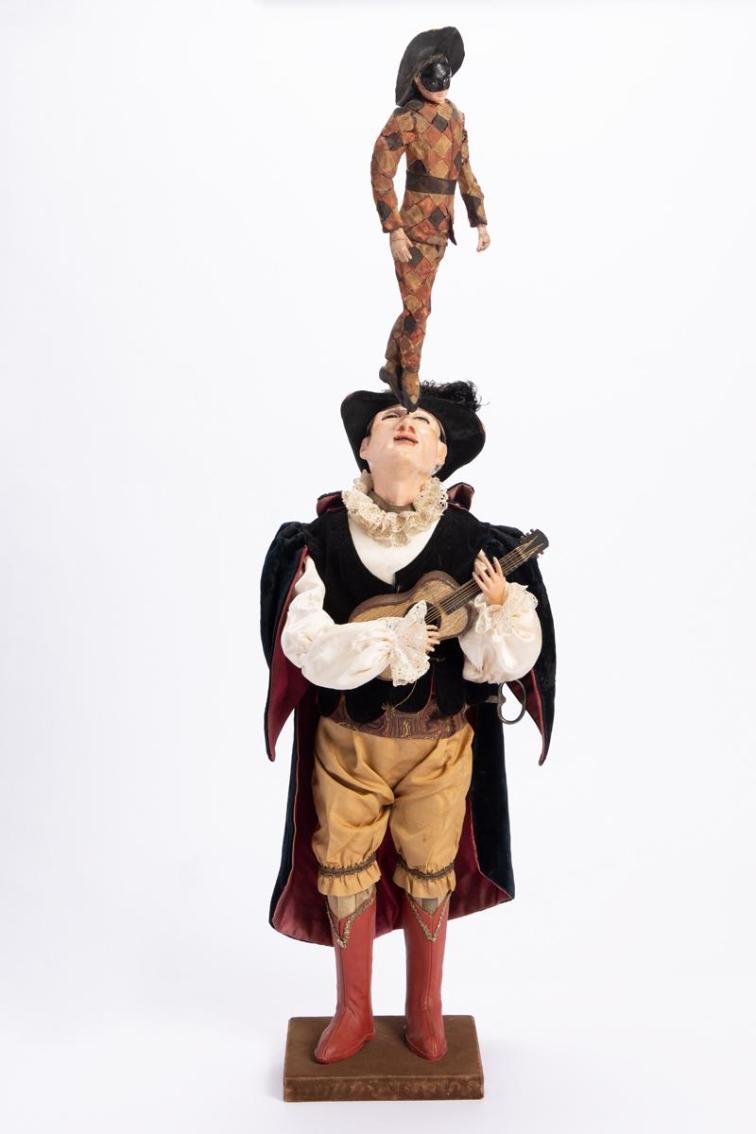 Guitar-Playing Troubadour with Pirouetting Harlequin